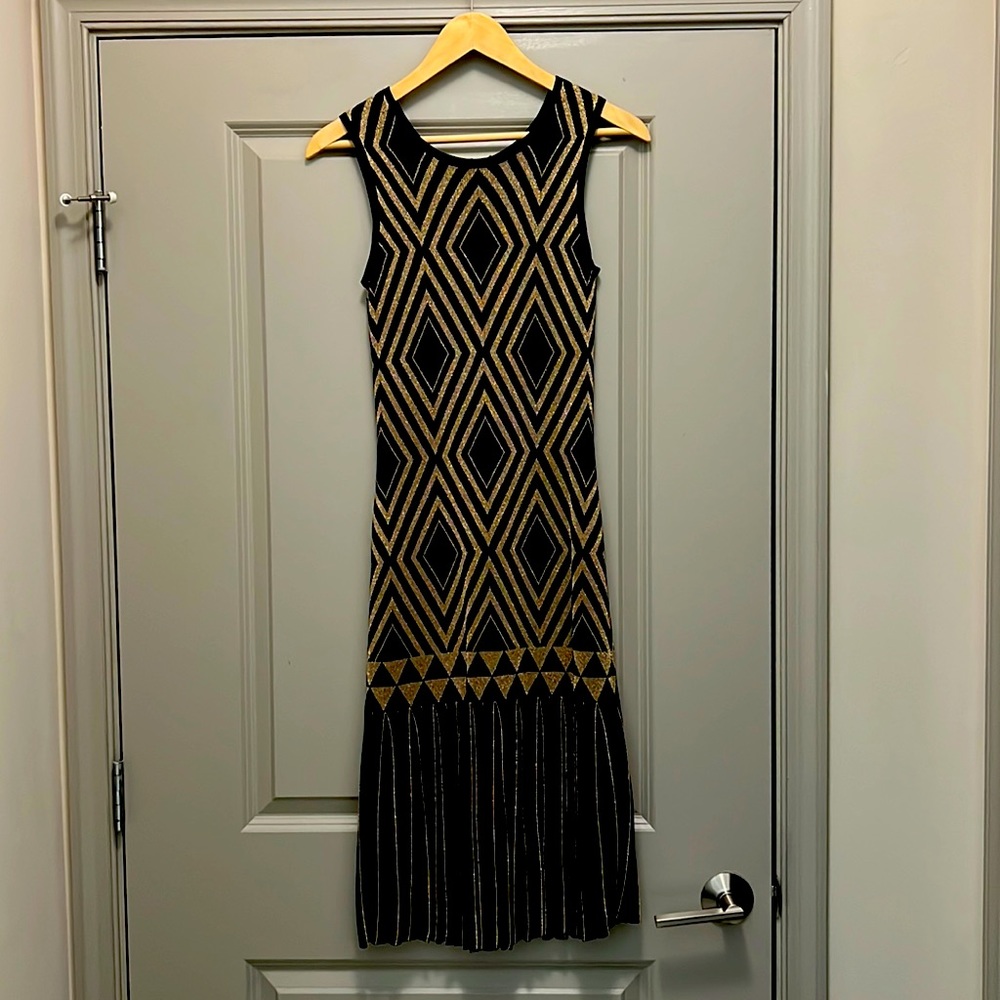 Ted Baker cocktail dress.Built in silky slip. Stretches and fits like a sheath.
